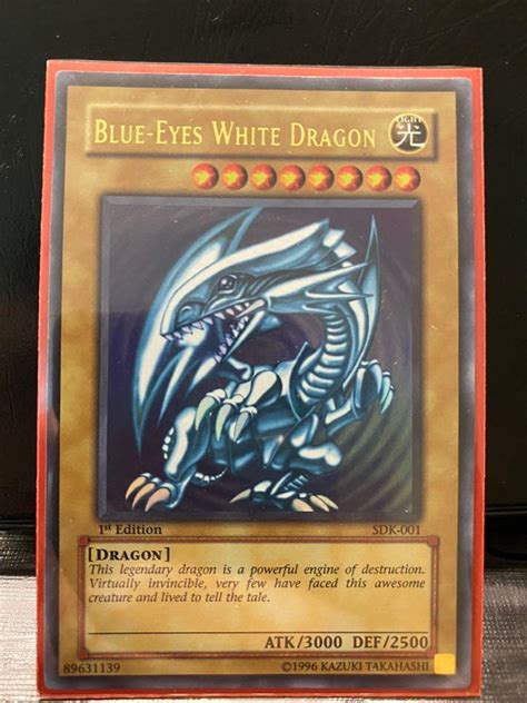 1996 blue eyes white dragon - You can Ritual Summon this card with "White Dragon Ritual". At the start of the Damage Step, if this card attacks a face-down Defense Position monster: Destroy that face-down monster. You can Tribute this card; Special Summon 1 "Blue-Eyes White Dragon" from your hand or Deck, but "Blue-Eyes White Dragon" cannot attack for the rest of this turn.